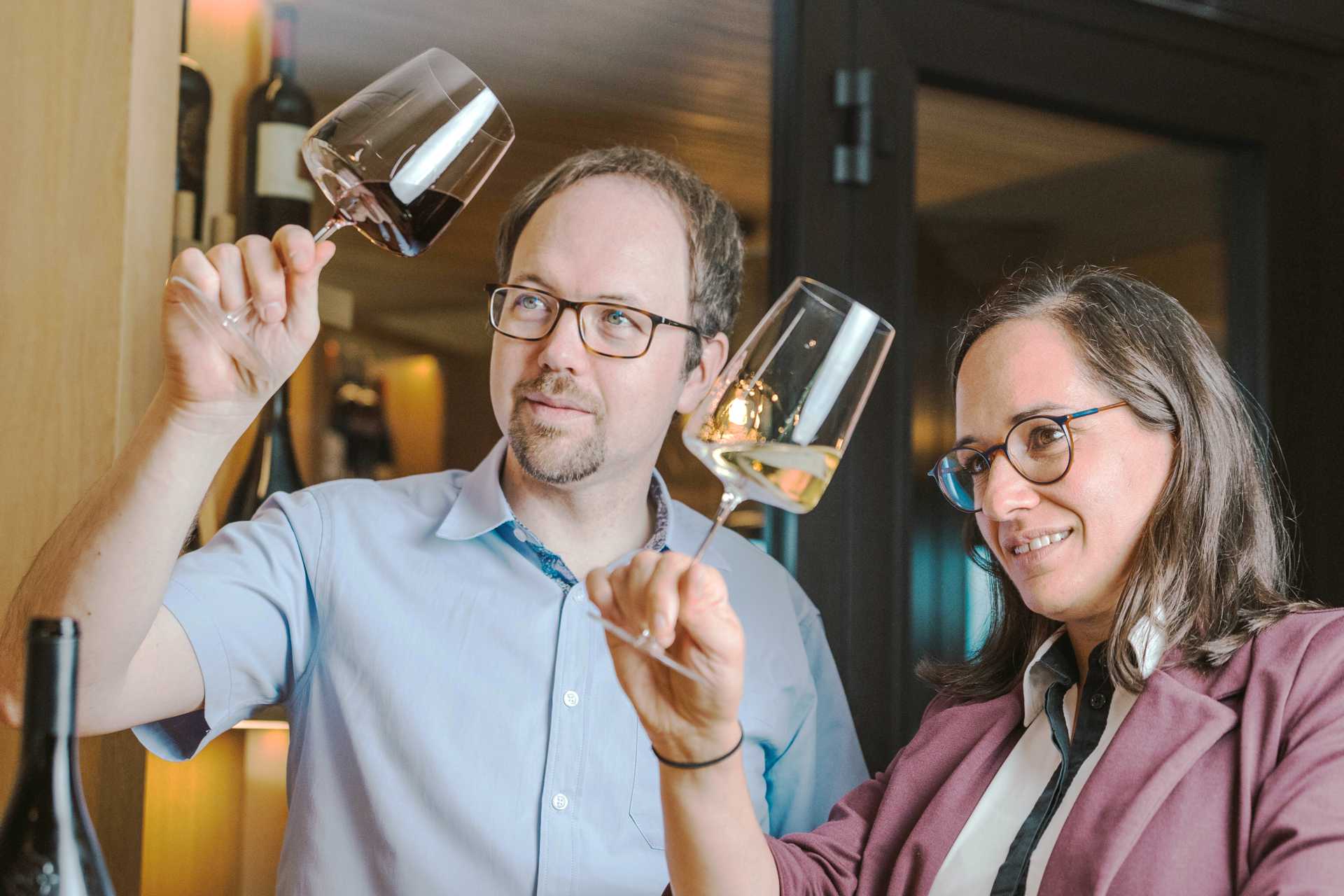 Heiner and Christa Christof engaged in a very pleasant activity: wine tasting Heiner and Christa Christof tasting wine