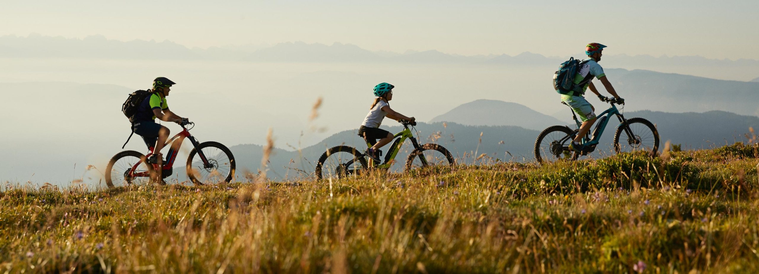 3 cyclists on a mountain tour