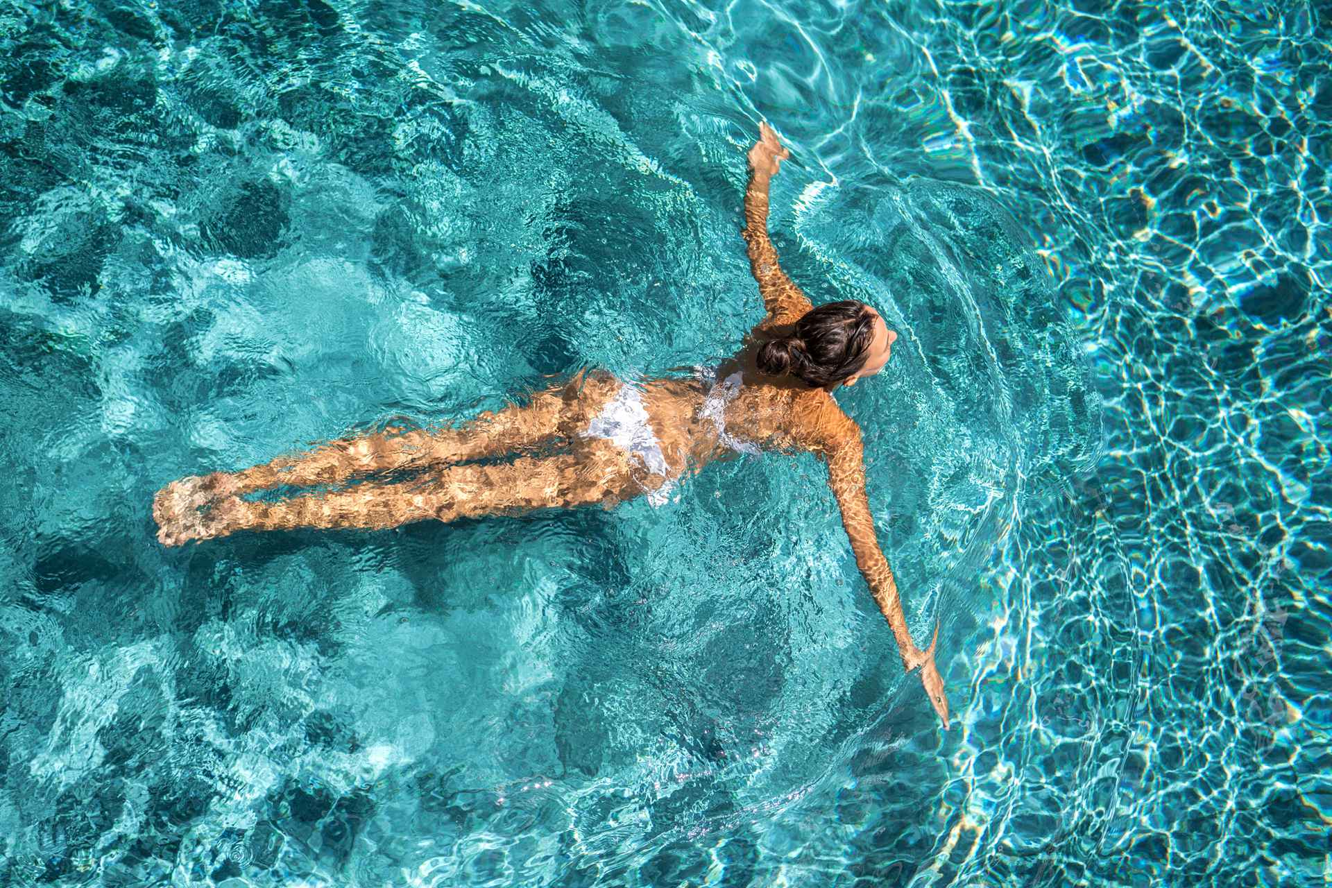 Swim laps or float. The choice is yours! Woman in swimming pool