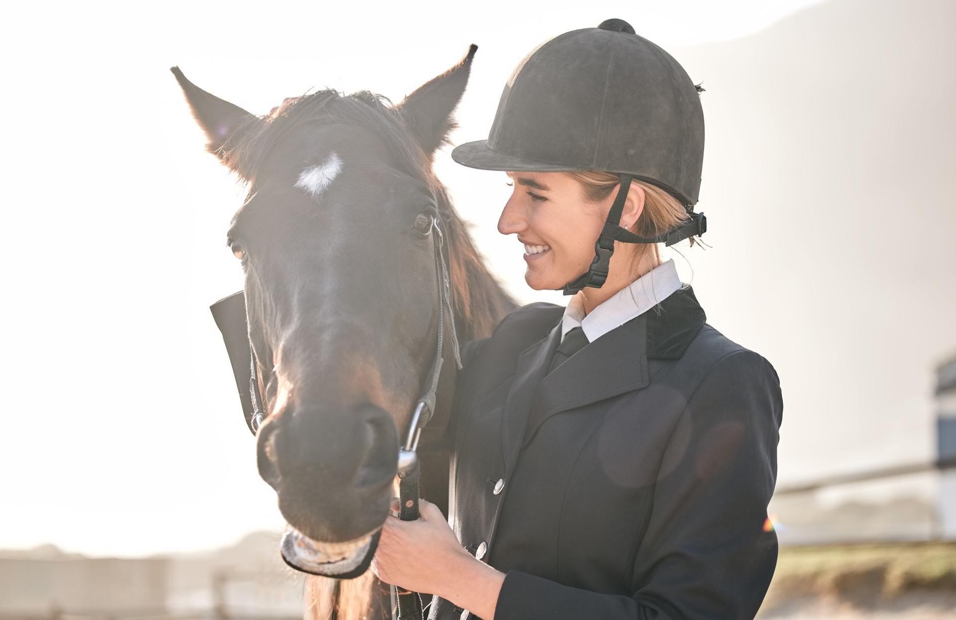 Woman and horse laugh